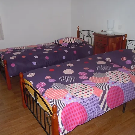 Hisa Carman Nyaraló *
